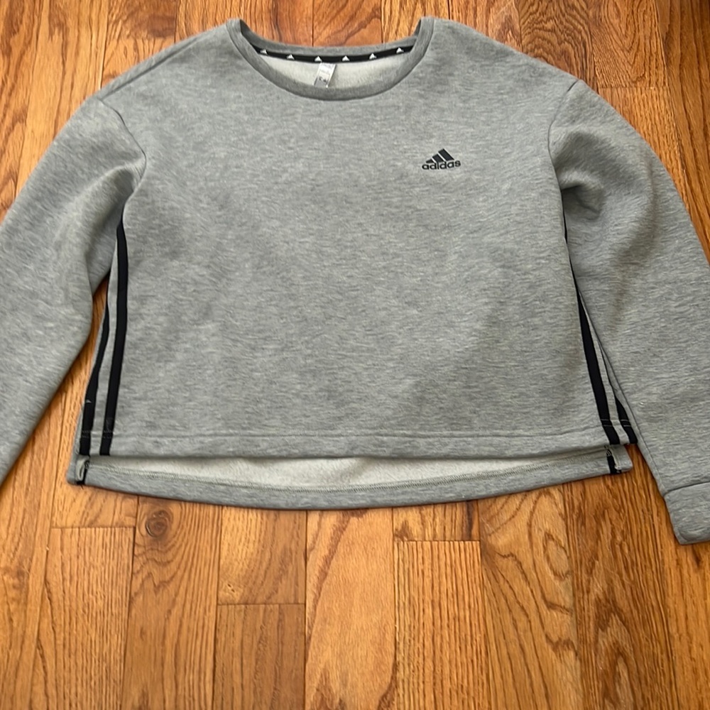 Grey adidas crewnecks with black stripes. Size large and never worn